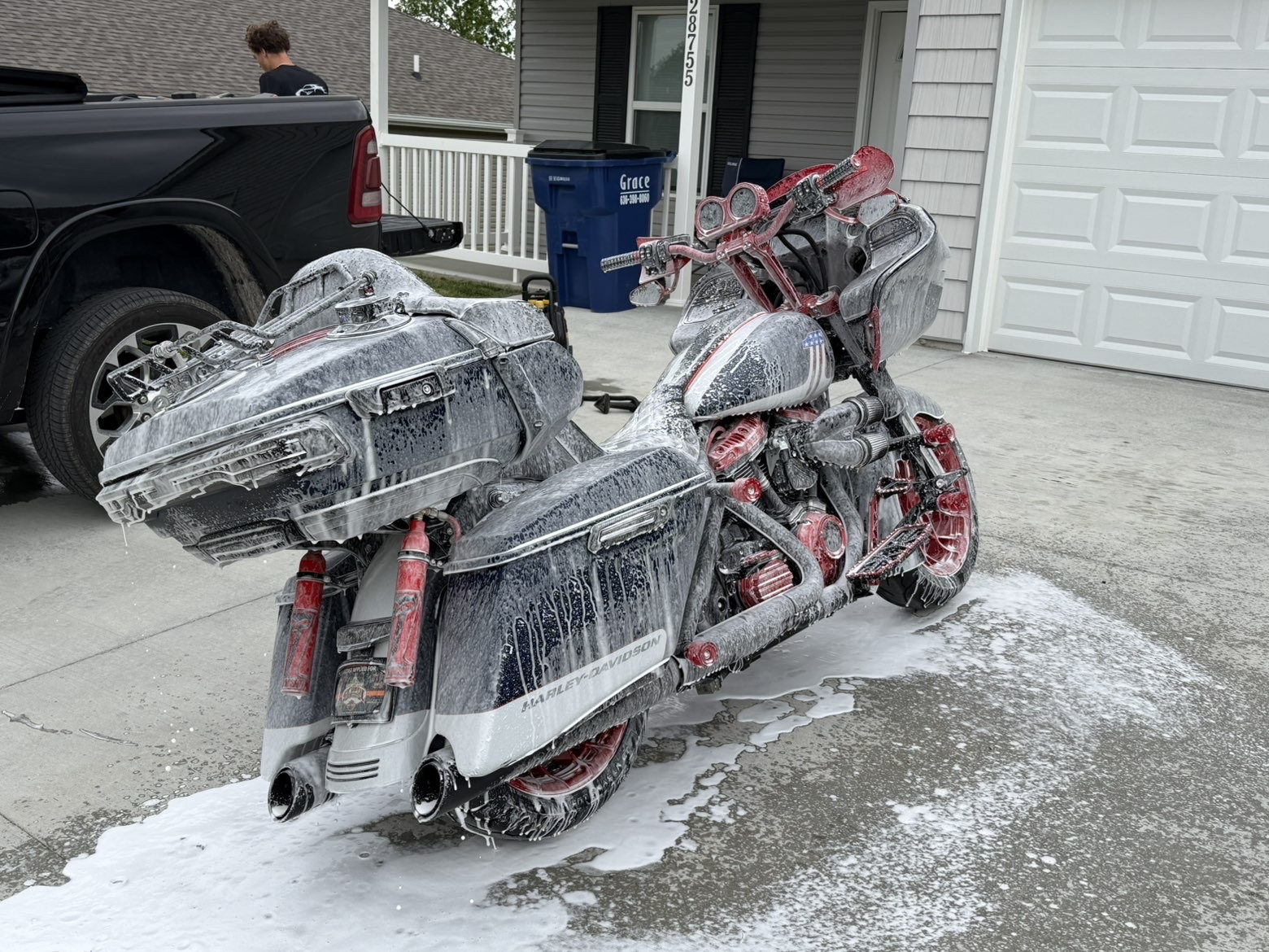 Motorcycle receiving an exterior foam wash