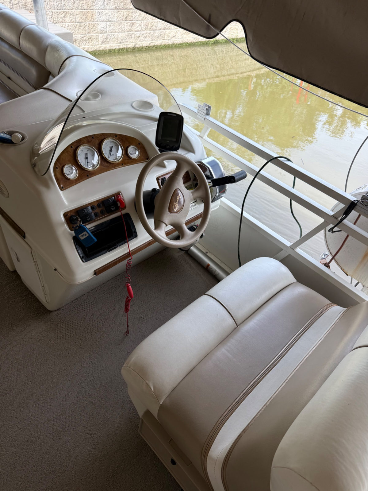 Pontoon boat helm and upholstery
