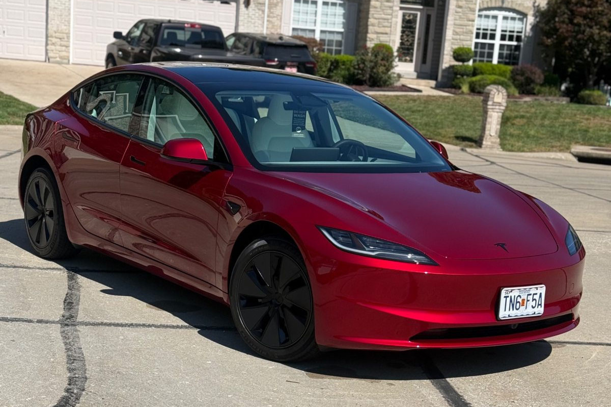 Red Tesla with ceramic coating and glossy finish